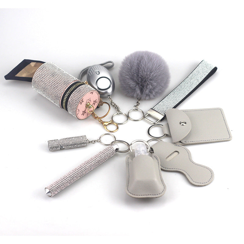 Amazon Outdoor Self-defense Flashlight Alarm 10-piece Set Keychain Accessories Bottle Convenient Fur Ball Pendant