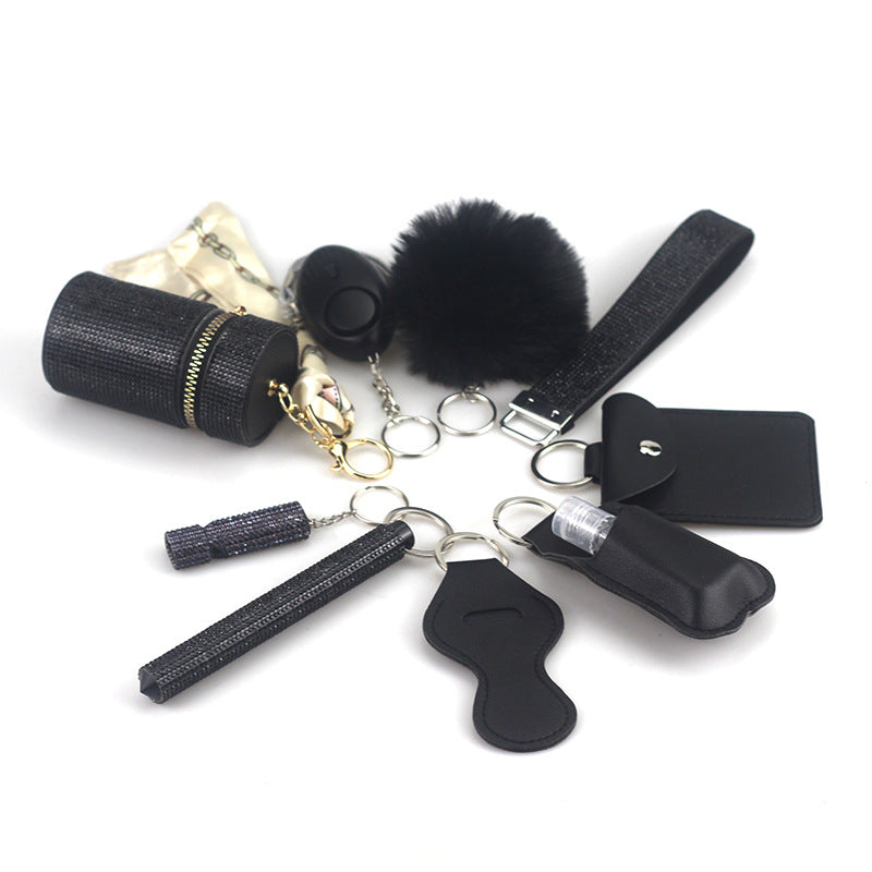 Amazon Outdoor Self-defense Flashlight Alarm 10-piece Set Keychain Accessories Bottle Convenient Fur Ball Pendant