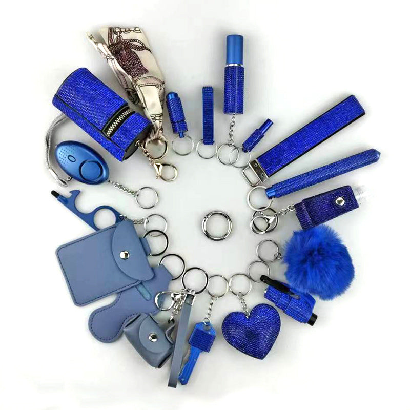 Amazon Outdoor Self-defense Flashlight Alarm 17-piece Set Keychain Accessories Bottle Convenient Fur Ball Pendant
