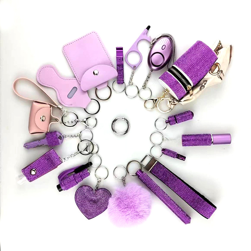 Amazon Outdoor Self-defense Flashlight Alarm 17-piece Set Keychain Accessories Bottle Convenient Fur Ball Pendant